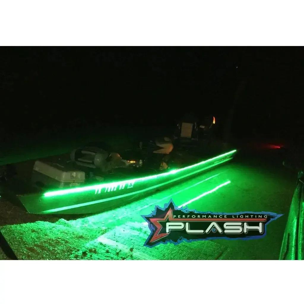 Green LED light strips illuminating the side of a boat at night, with a PlashLights logo.
