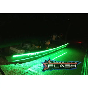 Green LED light strips illuminating the side of a boat at night, with a PlashLights logo.