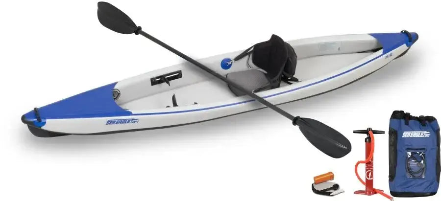 White and blue Sea Eagle 393rl RazorLite inflatable kayak with paddle, pump, and carry bag.