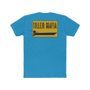 A bright blue short-sleeve t-shirt shown from the back, featuring a yellow rectangular graphic with the words 'TILLER MAFIA' in black and a black tiller hoe illustration.