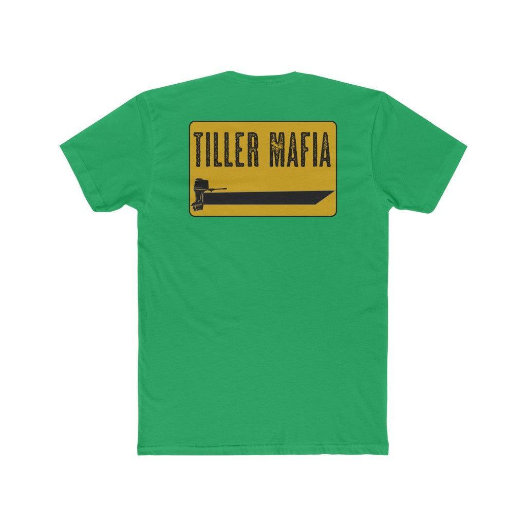 A green short-sleeve t-shirt shown from the back, featuring a yellow rectangular graphic with the text 'TILLER MAFIA' in black above a black tractor graphic.