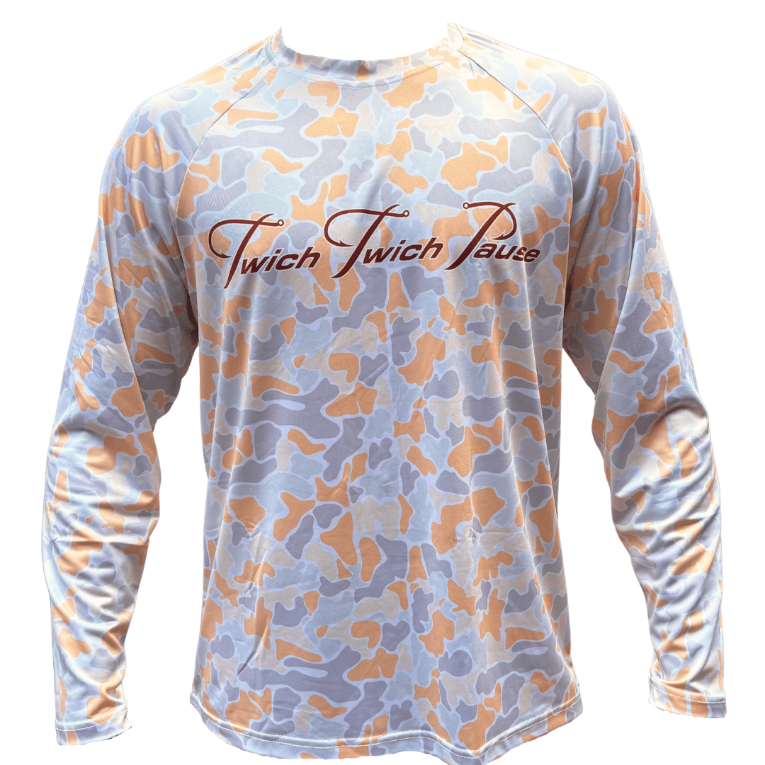 Long-sleeve shirt with camouflage pattern and 'Twitch Twitch Pause' text on a white background