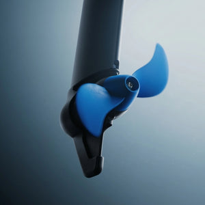 Close-up of a blue and black propeller of ePropulsion kLite 7500 outboard motor shown against a soft blue-gray gradient background.