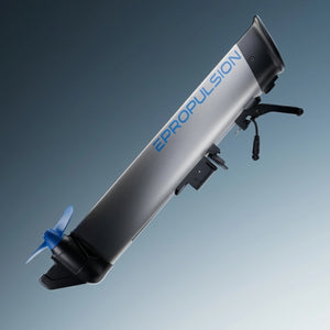 A ePropulsion kLite 7500 electric outboard motor by Epropulsion, featuring a silver and black cylindrical body with blue branding, a blue propeller, and a black throttle handle, shown against a gradient blue-gray background.