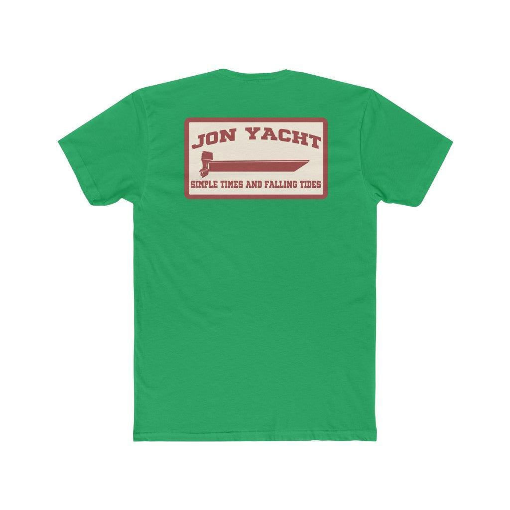 A green short-sleeve t-shirt shown from the back, featuring a rectangular graphic print with the text 'JON YACHT' and 'SIMPLE TIDES AND FALLING TIDES' in red and cream.