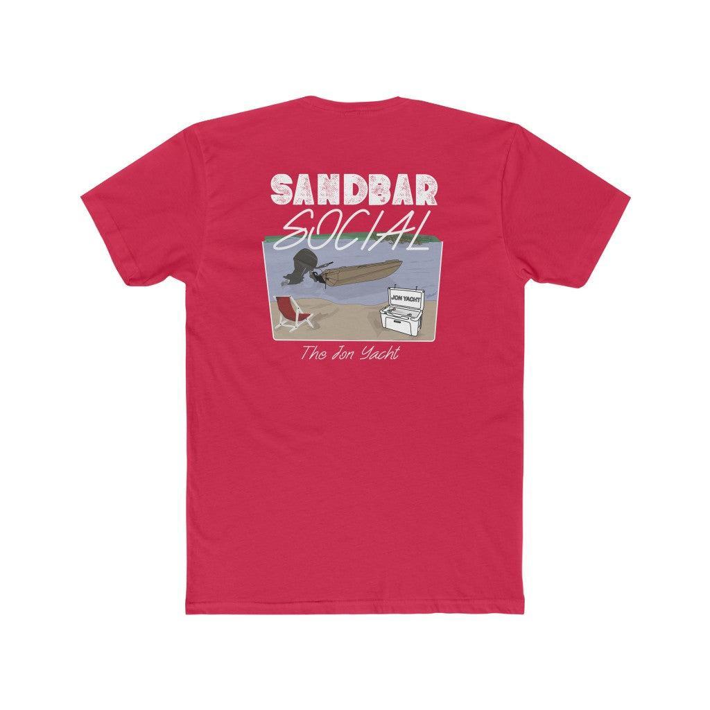 A red short-sleeve t-shirt shown from the back, featuring a graphic print with the text 'SANDBAR SOCIAL' and 'The Fun Yacht' over an illustration of a person on a yacht on a beach.