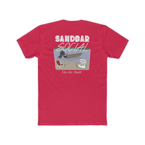 A red short-sleeve t-shirt shown from the back, featuring a graphic print with the text 'SANDBAR SOCIAL' and 'The Fun Yacht' over an illustration of a person on a yacht on a beach.