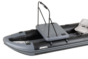 A gray and black sea eagle inflatable boat with a gray hatch cover, black support poles, and a white seat, shown on a plain white background.