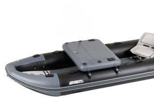 A gray and black sea eagle inflatable boat with a gray hatch cover and a white seat, shown on a plain white background.