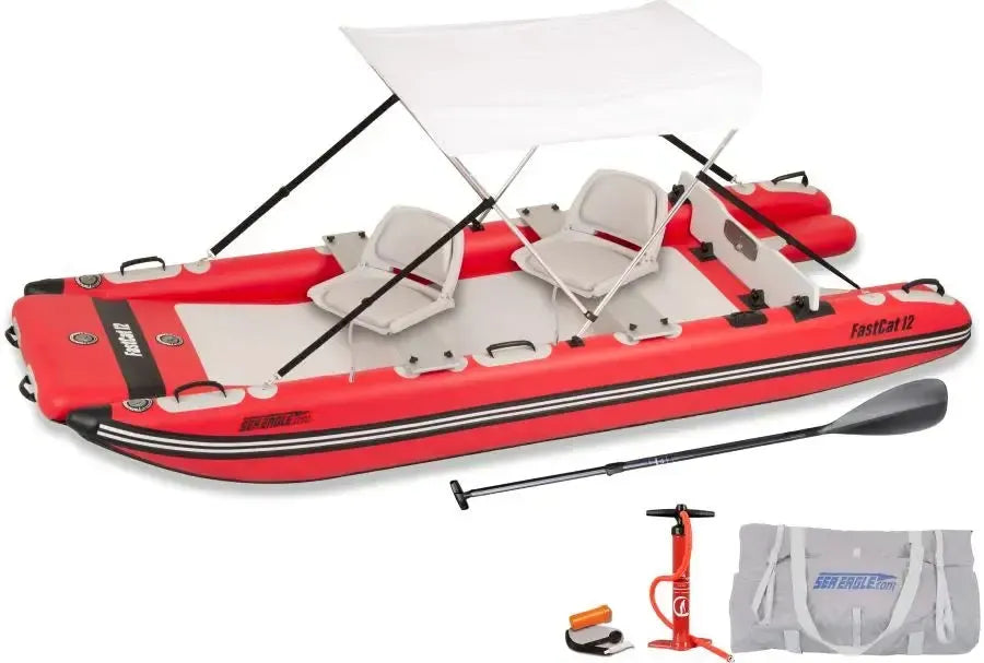 Red Sea Eagle FastCat12 inflatable catamaran boat with two seats, a white canopy, paddle, pump, and carry bag.