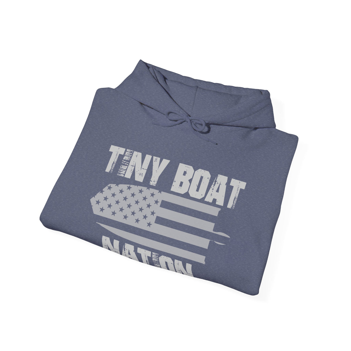 Folded blue hoodie with 'Tiny Boat Nation' text and American flag design on a white background