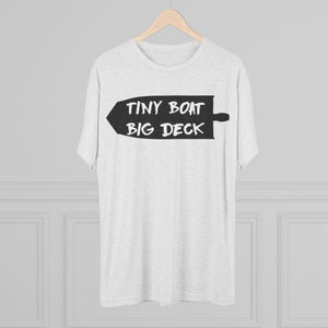 White t-shirt with 'Tiny Boat Big Deck' text on a hanger against a gray background