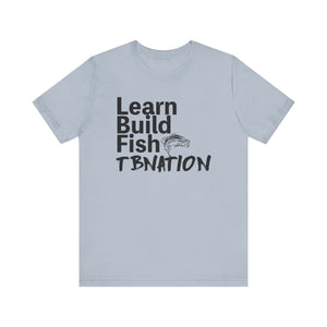 Light blue t-shirt with black text and fish graphic on a white background