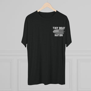 Black t-shirt with 'Tiny Boat Nation' text on a hanger against a gray background