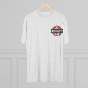 White t-shirt with a red and black graphic on a hanger against a gray background