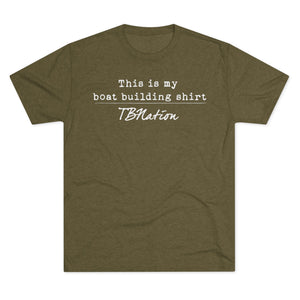 Green t-shirt with white text on a white background