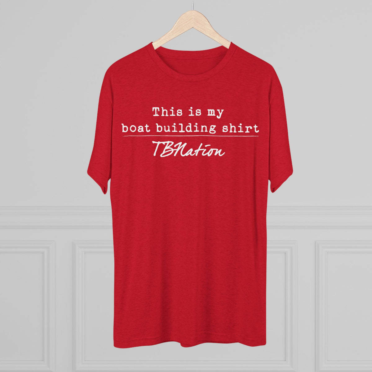 Red t-shirt with text on a gray background