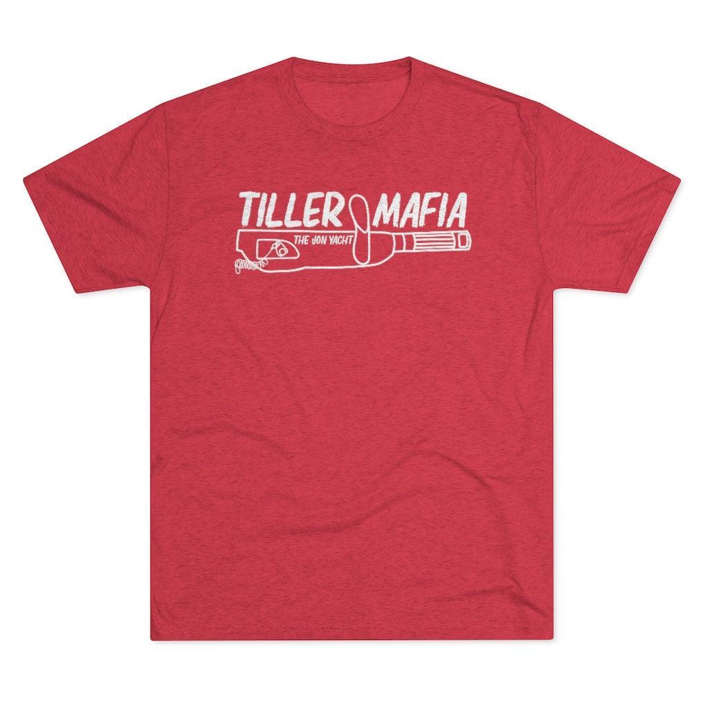 A heather red short-sleeve crewneck t-shirt with a white graphic print on the chest reading 'TILLER MAFIA' and 'JON YACHT' above a stylized lawnmower illustration.