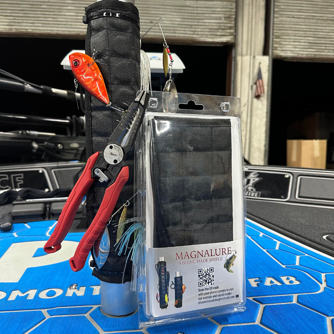 Black Magnalure magnetic wrap on a boat pedestal, holding lures, hooks, and red pliers.