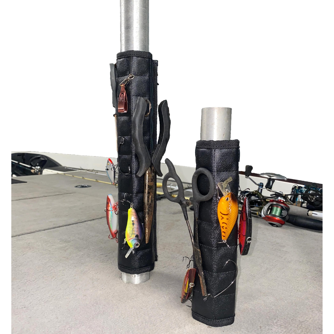 Black Magnalure magnetic wraps on boat pedestals, holding fishing lures, pliers, and scissors.