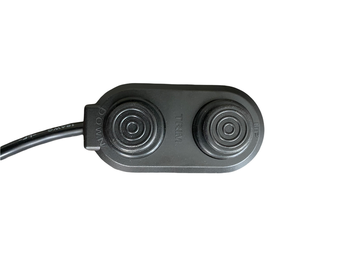 Black oval control switch with "DOWN" and "UP" buttons for an electric jack plate.