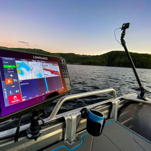 Railblaza Camera Boom 600 R-Lock mounted on a boat with a GoPro, beside a Lowrance fish finder.