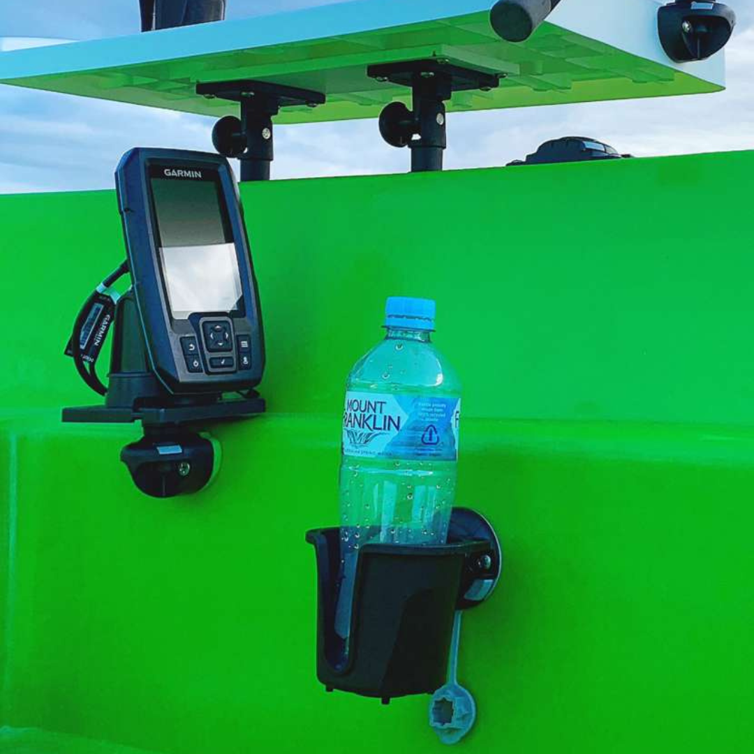 Black Railblaza DrinkHold mounted on a bright green boat, holding a water bottle next to a Garmin fish finder.