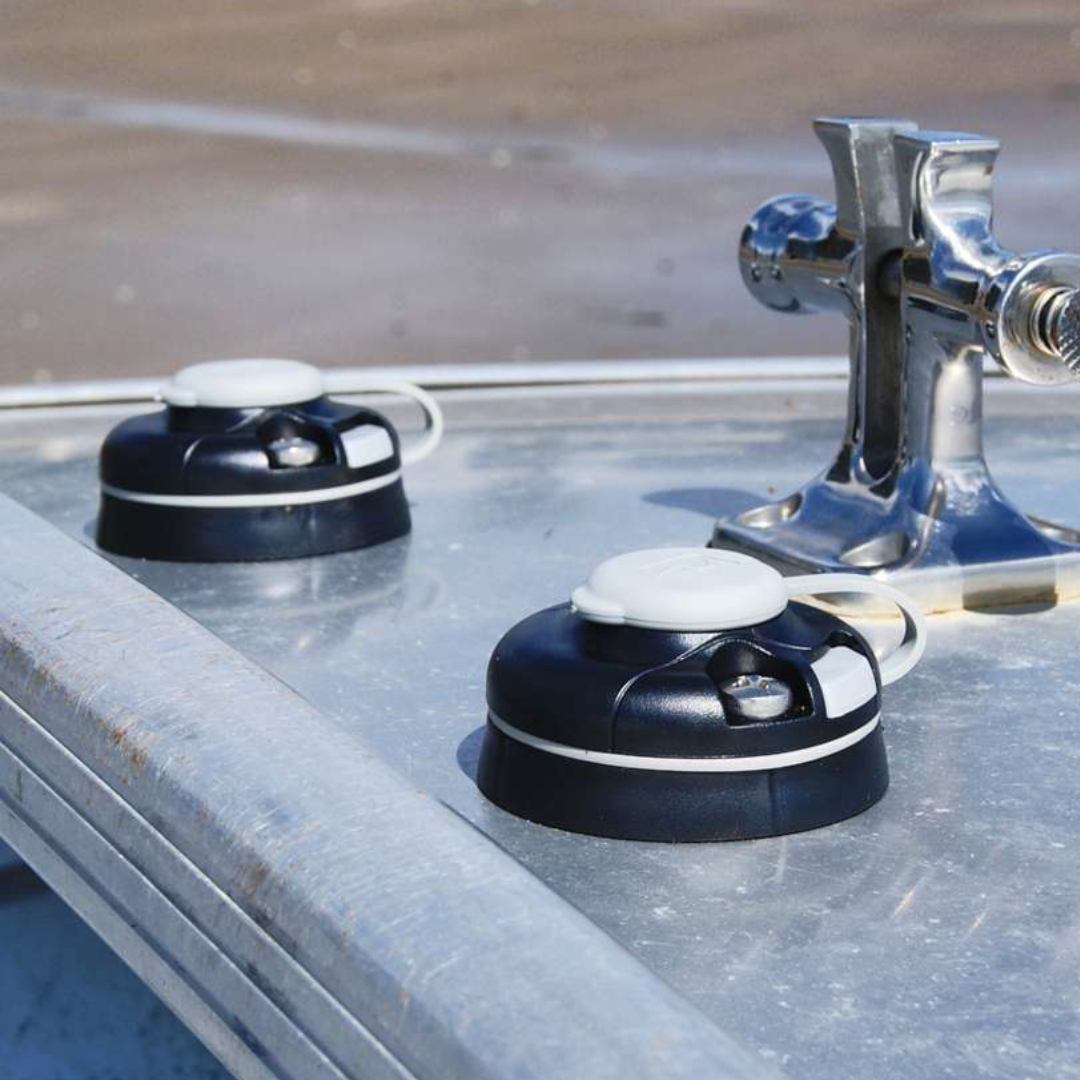 Black Railblaza StarPort Base with gray cap, gasket, and slide lock, showing two screws.