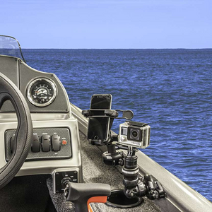 Black Railblaza Trackloader StarPort holding a smartphone and GoPro camera on a boat's gunnel.