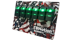 TBNation 6-gang rocker switch panel with green LED switches on a hydro-dipped American flag design.