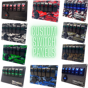 Assorted TBNation 6-gang rocker switch panels in various hydro-dipped aluminum camouflage patterns and carbon fiber.