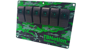 TBNation 6-gang rocker switch panel with green camouflage hydro-dipped aluminum plate and black switches.