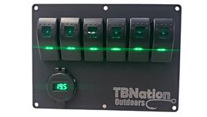 Black 6-gang TBNation Outdoors hydro-dipped aluminum switch panel with green LED rocker switches and voltmeter.