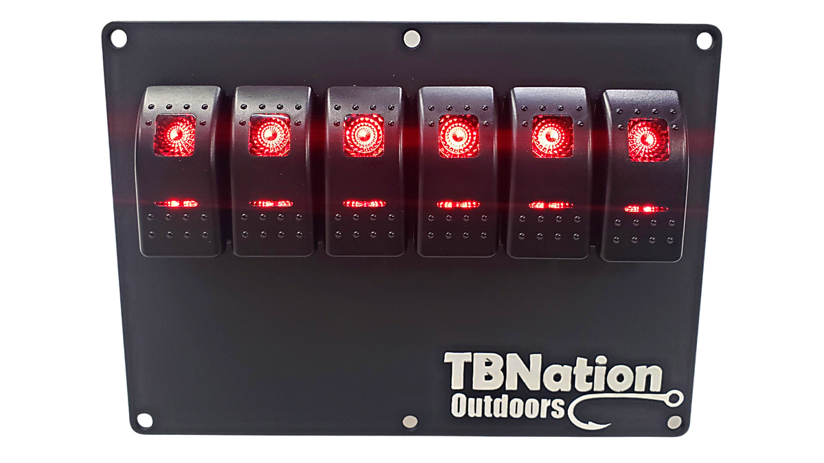 Black 6-gang TBNation Outdoors hydro-dipped aluminum rocker switch panel with six red illuminated switches.