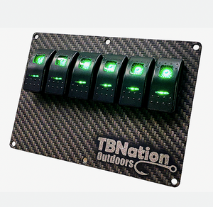 TBNation 6-gang rocker switch panel with carbon fiber hydro-dipped aluminum plate and green LED switches.