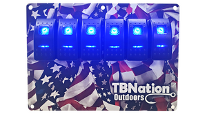 TBNation 6-gang rocker switch panel with blue LED switches on a hydro-dipped American flag aluminum plate.