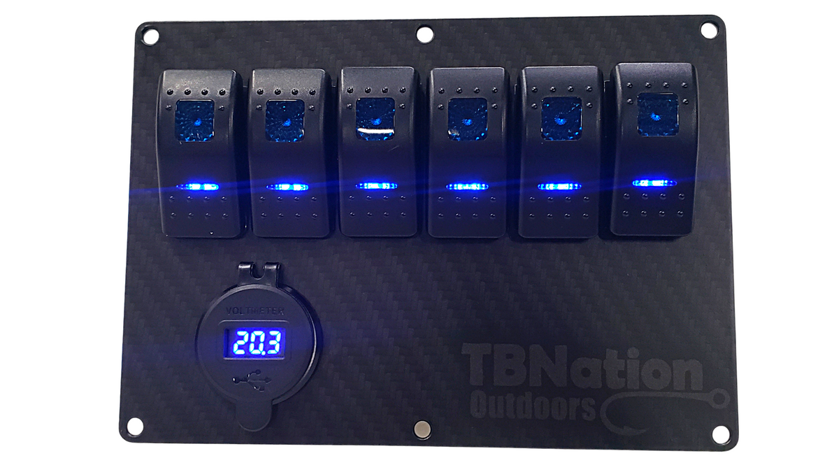 TBNation 6-gang carbon fiber switch panel with six blue LED rocker switches and a voltmeter.
