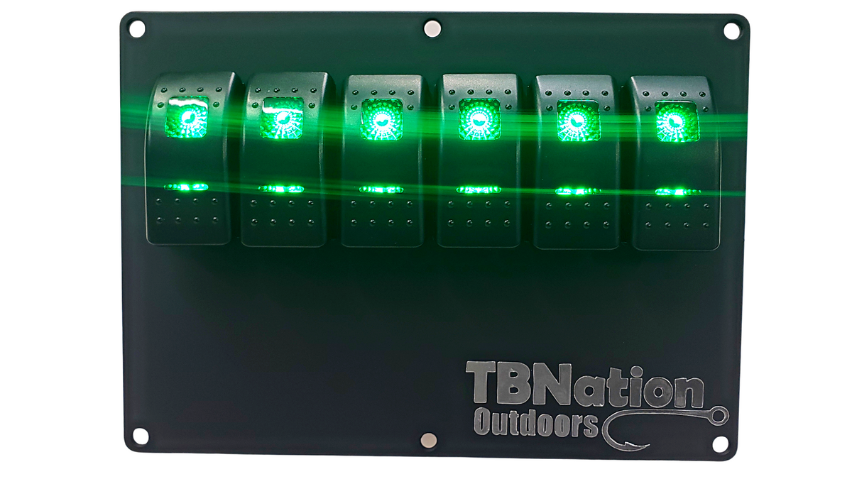 Black TBNation 6-gang hydro-dipped aluminum switch panel with six illuminated green rocker switches.