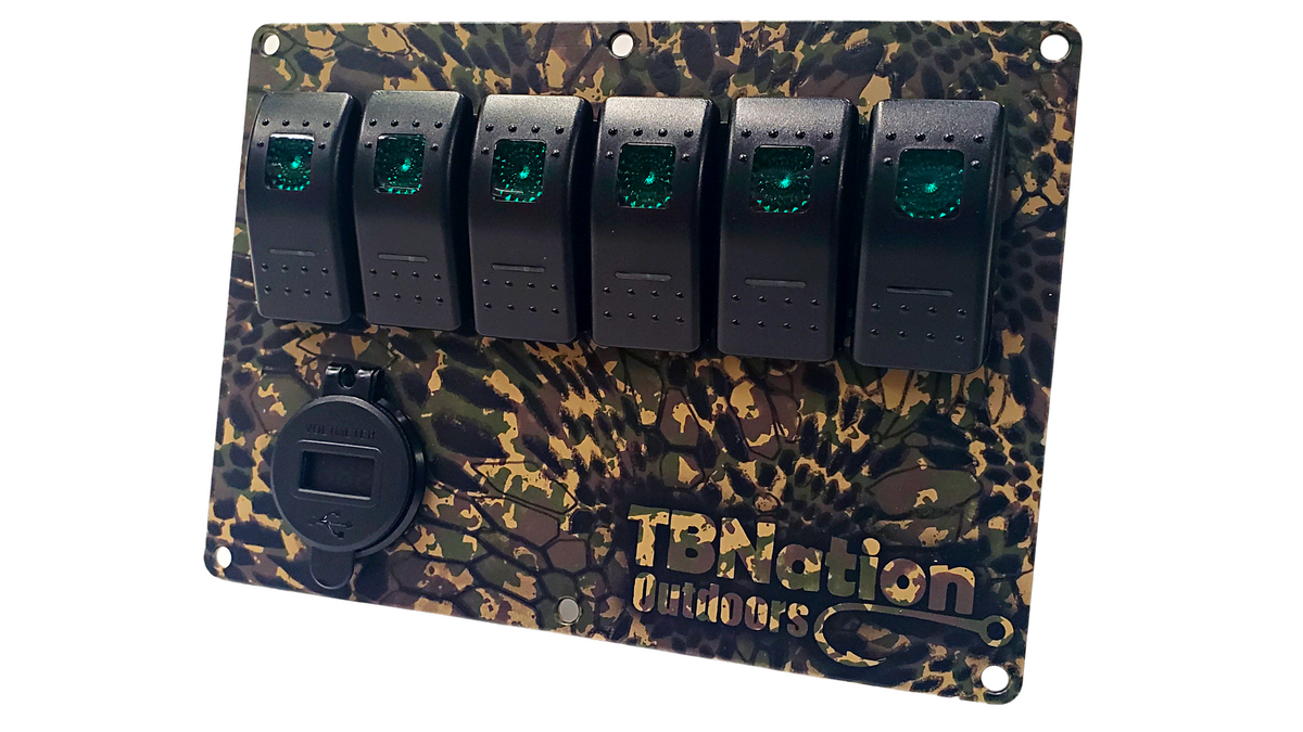 TBNation 6-gang rocker switch panel with green LED switches, a USB port, and a brown camouflage hydro-dipped aluminum plate.