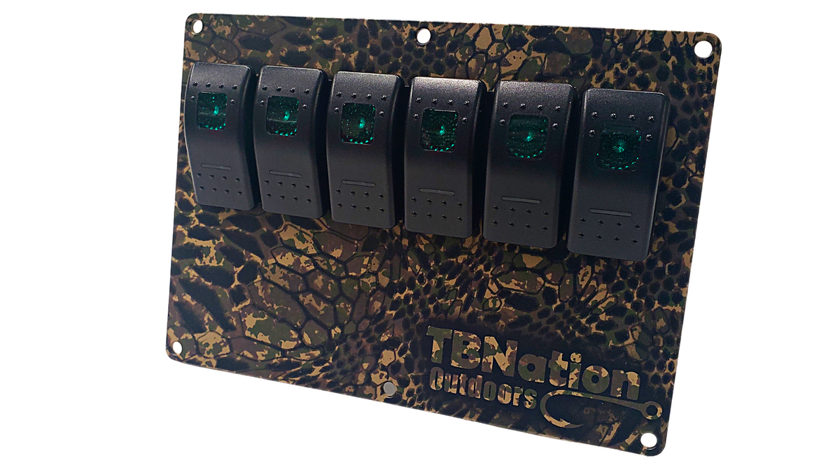 TBNation 6-gang rocker switch panel with a hydro-dipped camouflage aluminum plate and green LED switches.