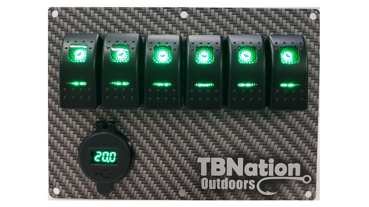 TBNation 6-gang carbon fiber hydro-dipped aluminum switch panel with green LED rocker switches and voltmeter.