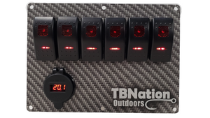 TBNation 6-gang rocker switch panel with carbon fiber hydro-dipped aluminum plate, red LED switches, and voltmeter.