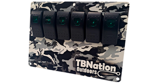 TBNation 6-gang rocker switch panel with black and gray camouflage hydro-dipped aluminum plate and green LED switches.